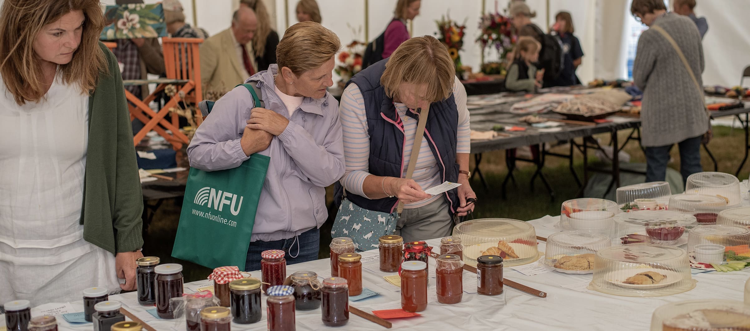 Local vendor selling jam and preserves to show visitors