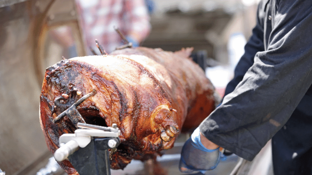 Hog roast cooking at one of the show’s hot food stalls