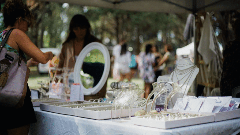 Jewellery and accessories displayed at an indoor craft stall