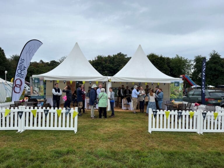 Entrance to The Alresford Show with fencing and signage